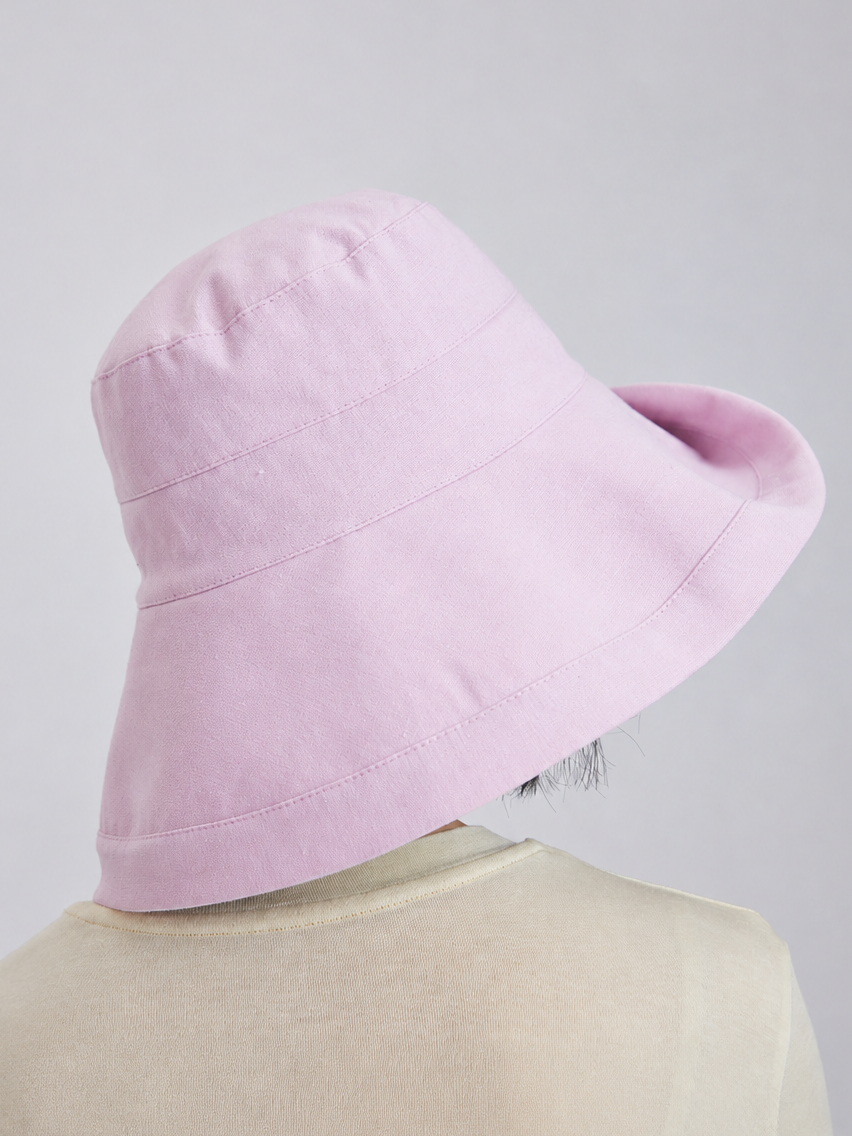 Margo & Main – Elke pink wide-brim bucket sun hat photographed from the back, showing the depth of the brim at the neck