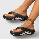 Margo & Main - black cushioned arch-support thong sandals worn on foot, US women's sizes