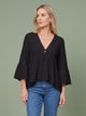 Melba Lane - black bell sleeve V neck blouse, full length studio view, AU women's sizes