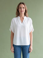 Melba Lane - white split neck flutter sleeve top, full length studio view, AU women's sizes