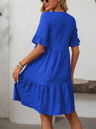 Margo & Main – Vianne royal blue textured tiered short-sleeve dress, cropped front view of the tiered skirt, US women's sizes