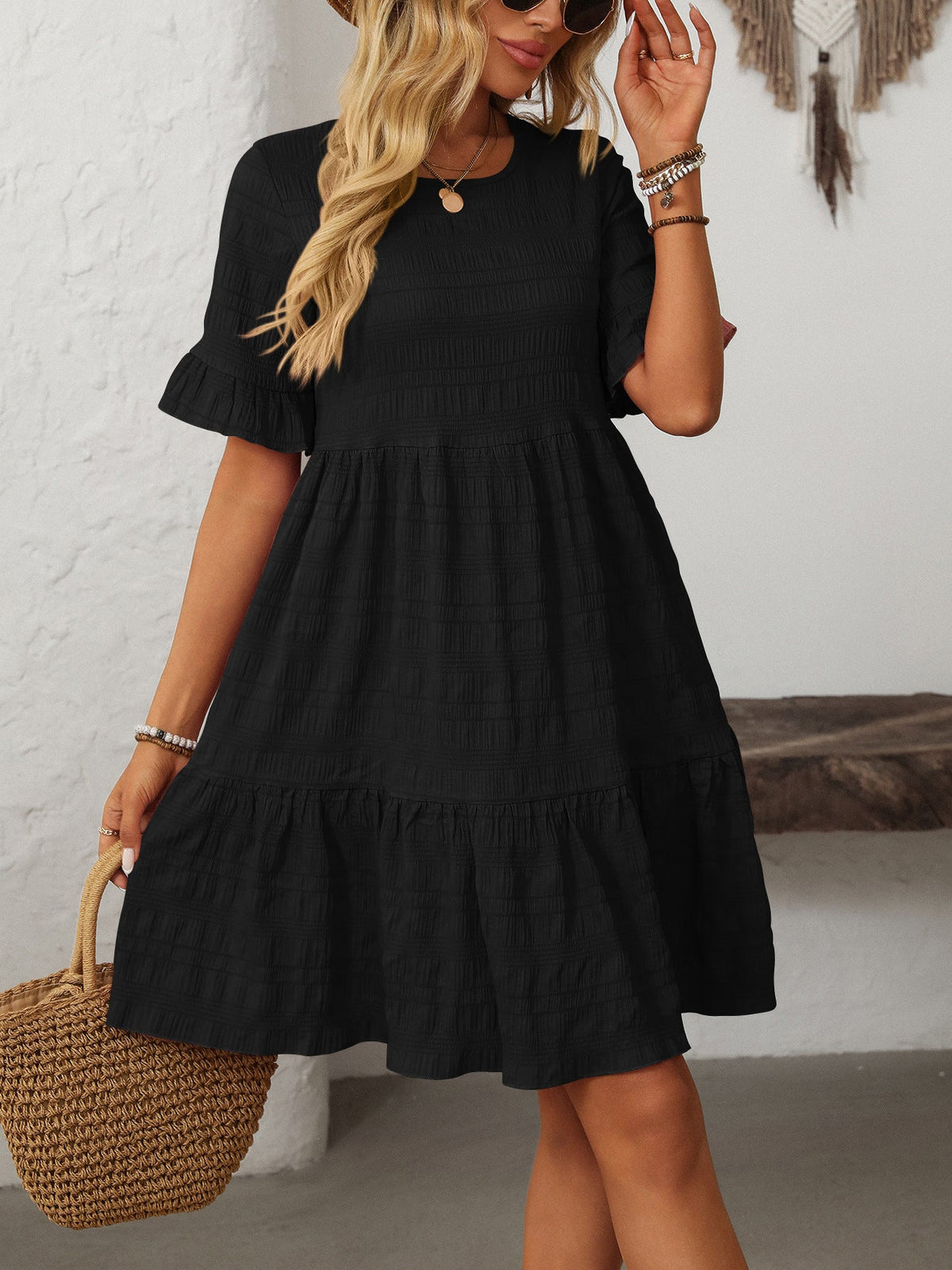 Margo & Main – Vianne black textured tiered short-sleeve dress, front view close on the flounce sleeve, US women's sizes