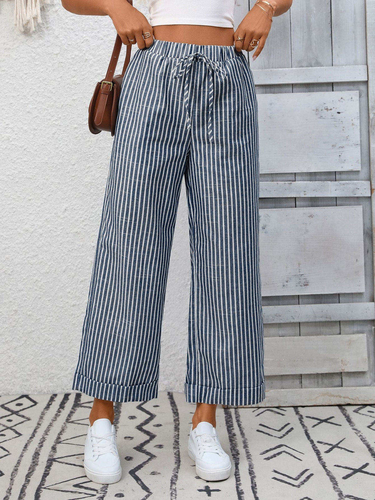 Margo & Main – Cosetta denim blue striped cropped wide-leg pants, front view styled with a brown shoulder bag, US women's sizes