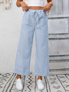 Margo & Main – Cosetta light blue striped cropped wide-leg pants, front view with hands at the waistband, US women's sizes