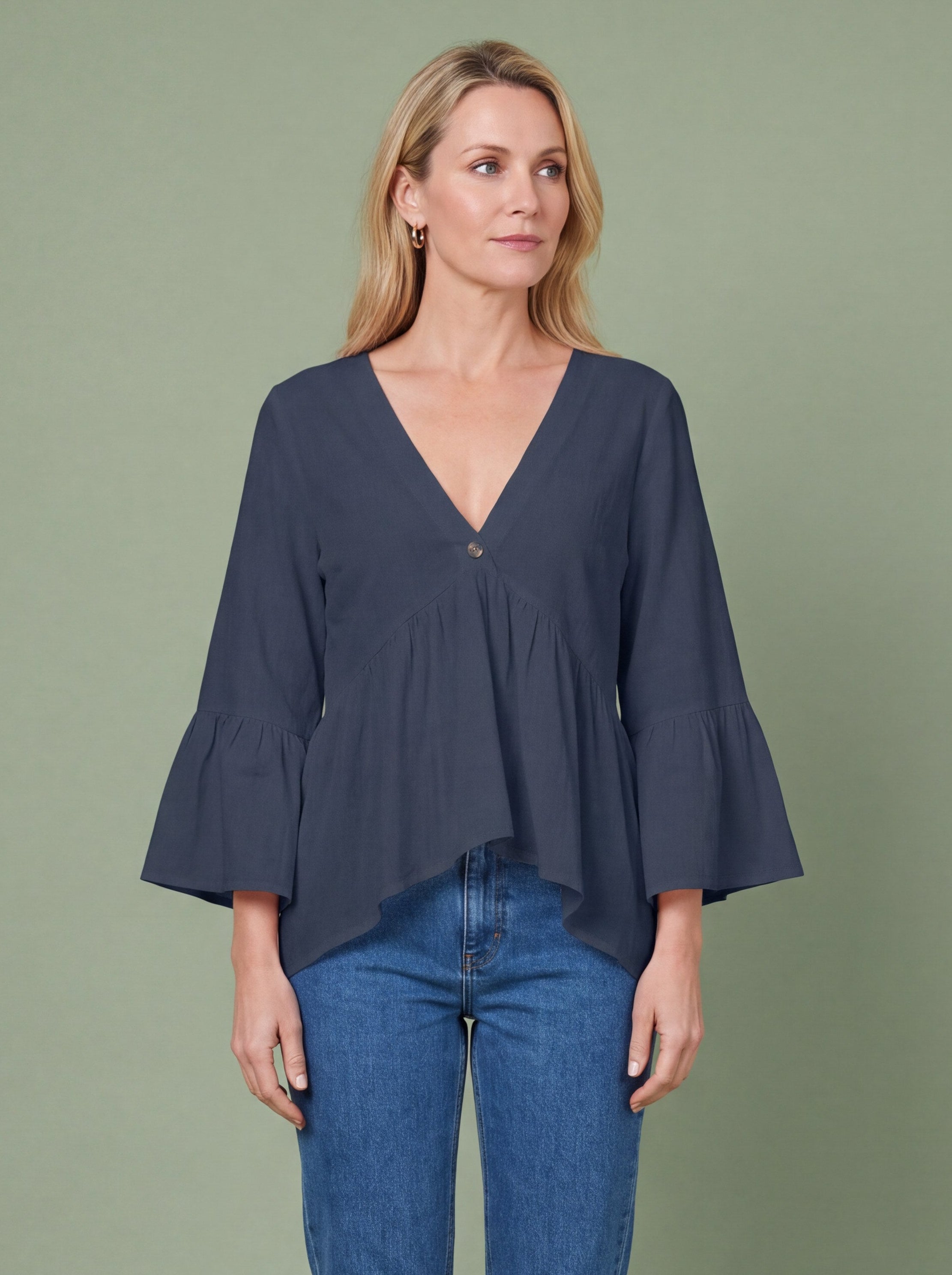 Melba Lane - navy bell sleeve V neck blouse, full length studio view, AU women's sizes