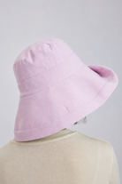 Margo & Main – Elke pink wide-brim bucket sun hat photographed from the back, showing the depth of the brim at the neck