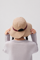 Margo & Main – Sabella tan side of the reversible sun hat from the back, burgundy band and split brim visible