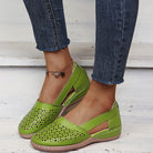 Melba Lane - green perforated slip on shoes, angled pair view on steps, AU women's sizes