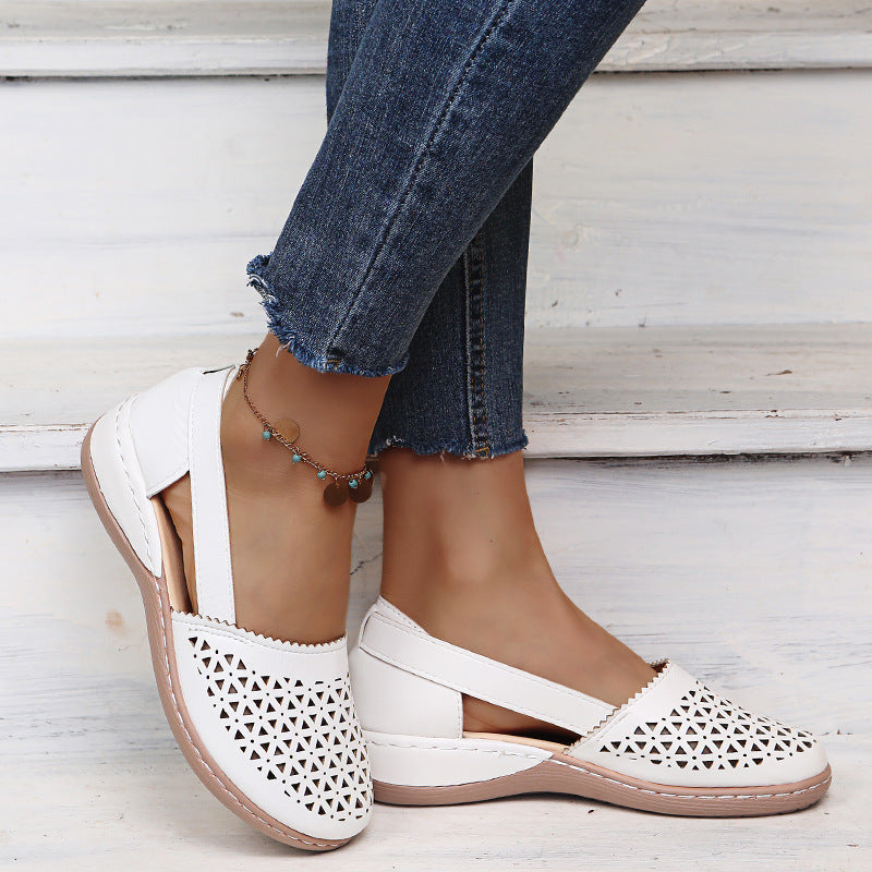 Melba Lane - white perforated cutout slip on shoes, front view on model, AU women's sizes