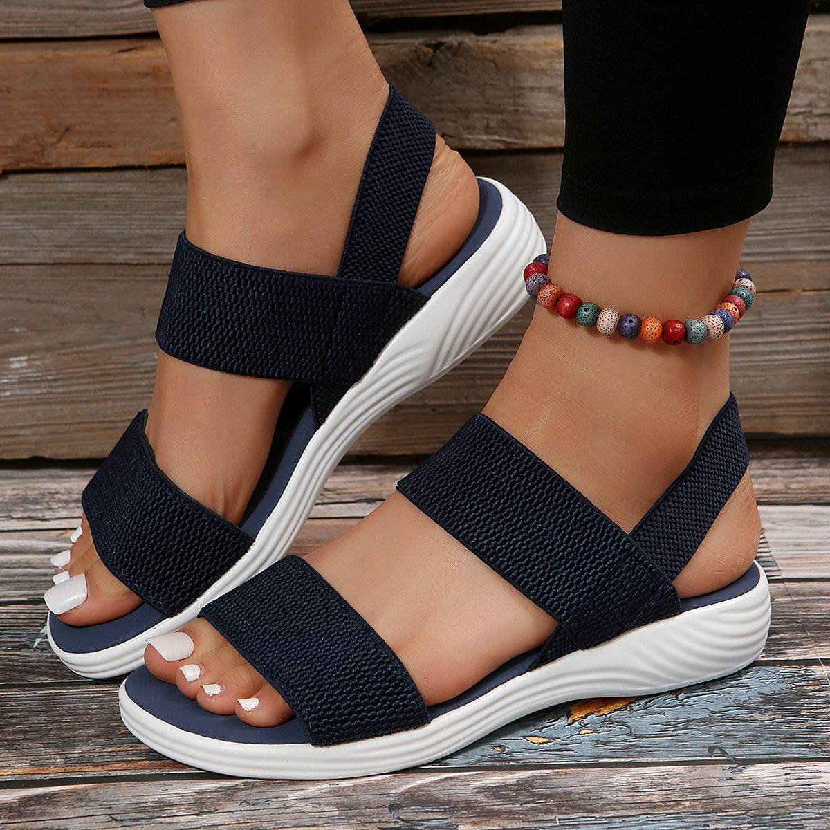 Melba Lane - blue stretch strap platform sandals, worn side view on decking, AU women's sizes