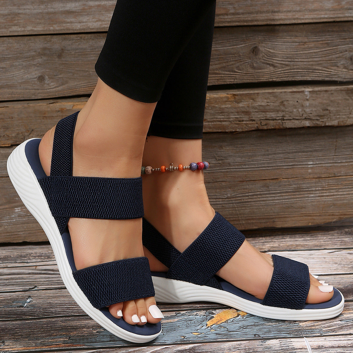 Melba Lane - blue stretch strap platform sandals, worn angled view outdoors, AU women's sizes
