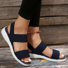 Melba Lane - blue stretch strap platform sandals, worn angled view outdoors, AU women's sizes
