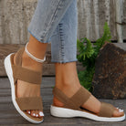 Melba Lane - tan stretch strap platform sandals worn with jeans, worn view, AU women's sizes
