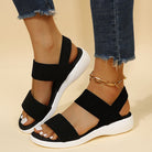 Melba Lane - black stretch strap platform sandals, worn front view with jeans, AU women's sizes