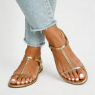Melba Lane - gold t-strap flat sandals with toe loop, worn with jeans, AU women's sizes