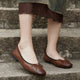 Melba Lane - brown and cream sheepskin bow ballet flats, worn on steps, AU women's sizes