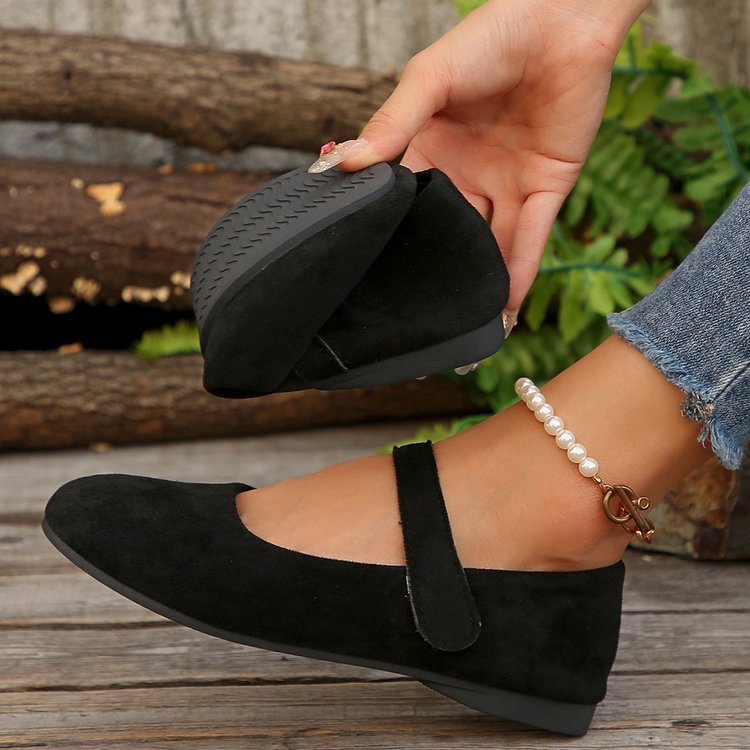 Melba Lane - black rounded toe Mary Jane flats, single shoe held in hand, AU women's sizes
