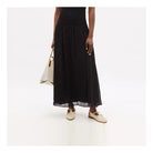 Melba Lane - cream woven slingback flats worn with a long black dress, AU women's sizes